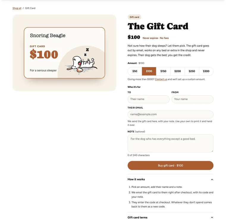 Snoring Beagle gift card page with a card showing the sleeping beagle and $100, six amount buttons from $50 to $300, fields for names, email and a note, and how it works